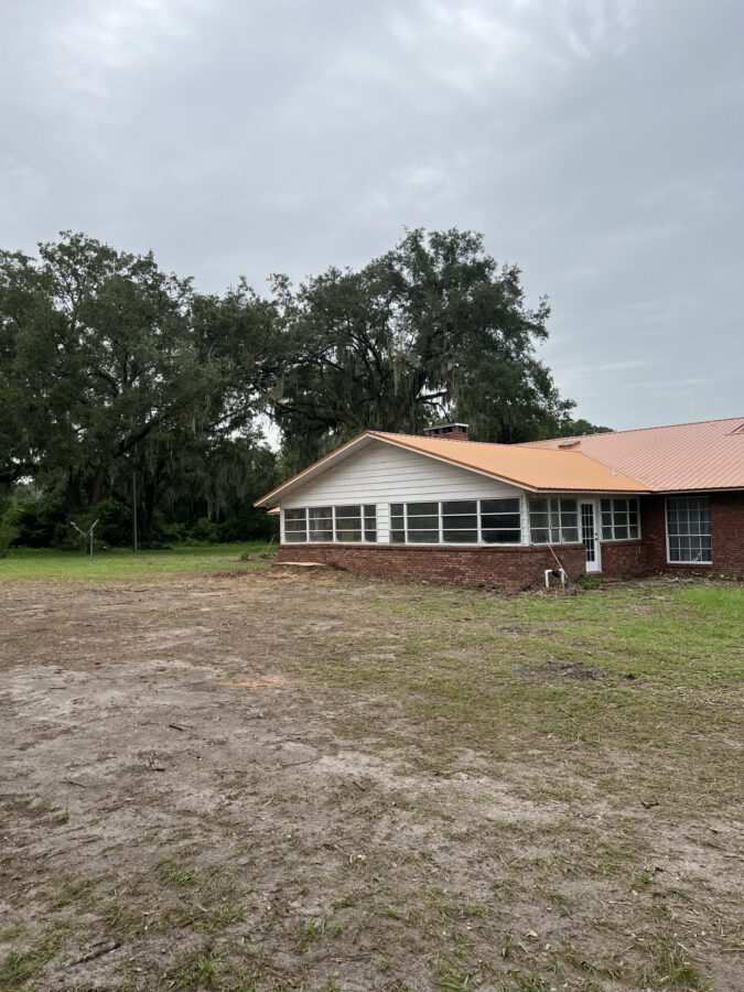 The same home after removal with a clean, undamaged yard